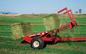 New Bale Scoop for sale at Hanlon Ag Centre in Lethbridge, Alberta, Canada. Hay and forage equipment bale stacker