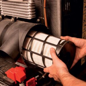 Replacing filters. Parts and service included with Genuine Care service contracts.