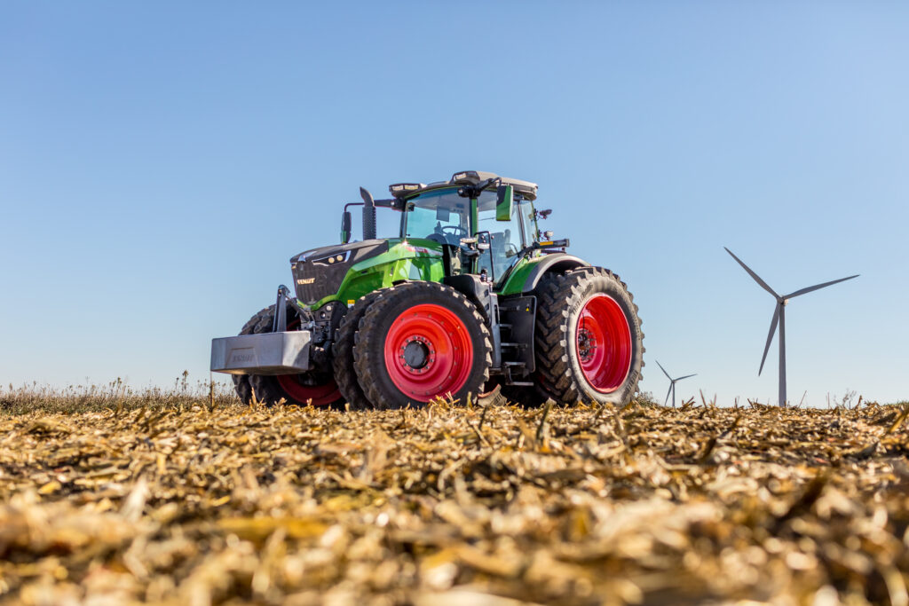 Fendt 1052 Gen 4 tractor operating in a harvested field in southern Alberta, showcasing modern agricultural equipment available at Hanlon Ag Centre.