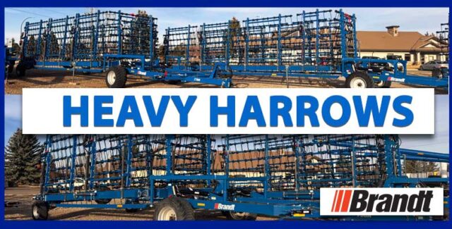 Brandt heavy harrows in stock at Hanlon Ag Centre in southern Alberta, featuring large blue folding harrow units available in 50 ft, 70 ft, and 82 ft working widths parked on dealership lot