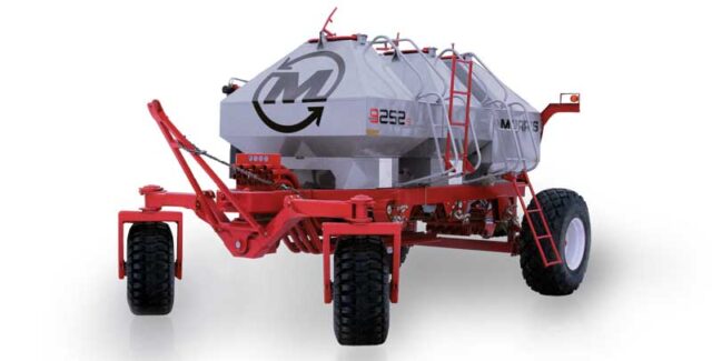 The Morris 9S Series air cart is a precision seeding system used by Southern Alberta farmers for accurate seed and fertilizer placement across large grain fields.