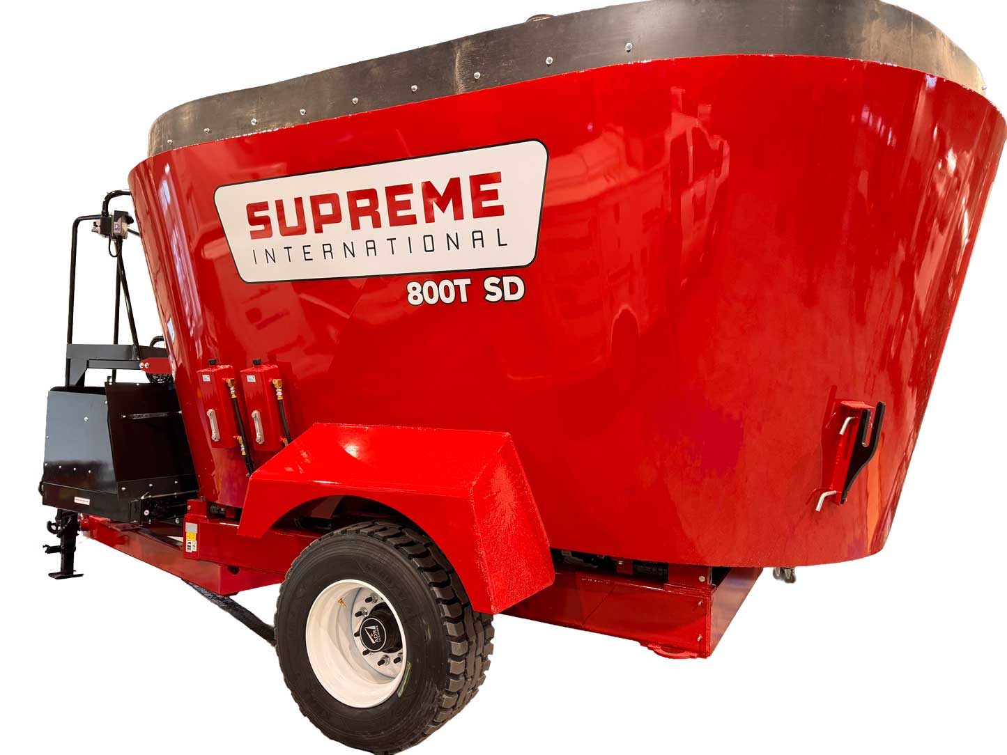 Supreme International 800T SD feed mixer wagon for efficient cattle feed mixing in southern Alberta operations.